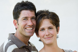 Man and woman smiling