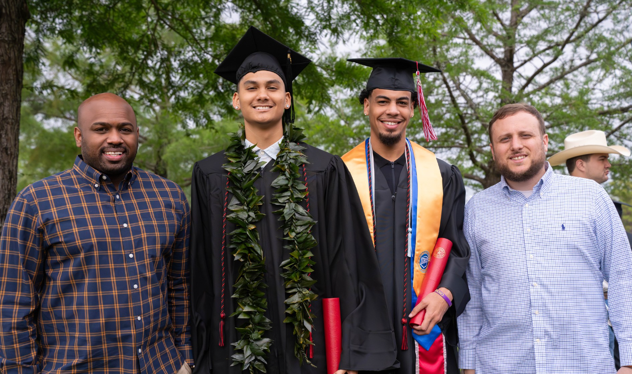 Two Coaches, Two Students at Graduation