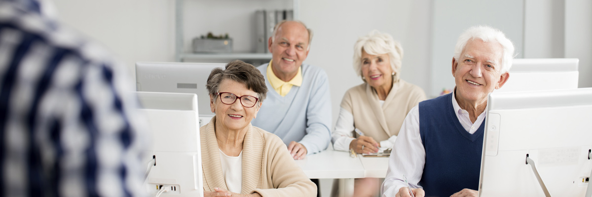 Elderly men and women in a classroom